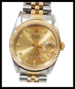A vintage 1980's Rolex 18ct gold and diamond Oyster Perpetual Day - Date Watch Superlative
