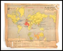 A large vintage early 20th century French map of the globe and Europe with the French Colonies
