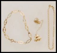 A 9ct gold bracelet having pierced hourglass spacers uniting by c-clasp ( 16cms long ) together with