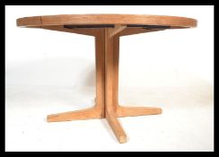 A vintage retro 20th century teak wood circular ex