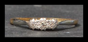 A Henry Griffith and Son 18ct gold and platinum th