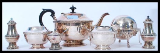 A group of silver plated items to include a tea service, teapot, butter dish etc. Please see
