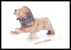 A Coalport ceramic Guinness advertising figurine Lion. Limited Edition 16/1200. Complete in original