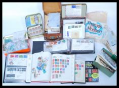 A very large assortment of vintage GB and World stamps and FDC's in albums and loose. Also some