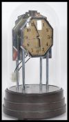 An early 20th century French electric Bulle glass domed anniversary mantle clock having an Art