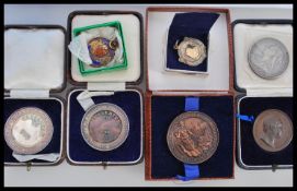 Two silver halllmarked Football Association fob medals together with Amateur Gardening medals and