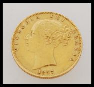 A 19th century Victorian rare Shield Back sovereign gold coin - Queen Victoria young bust with
