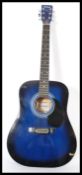 A vintage six string acoustic guitar by Falcon model no FG100BL finished in a vibrant blue colour