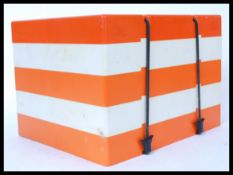 A retro mid century, circa 1960's / 70's Pac-A-Pik plastic stacking picnic box. In orange and