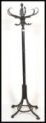 A vintage retro 20th century bentwood coat stand in the manner of Thonet having an ebonised
