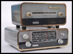 A vintage 20th Century Heathkit Model F.M. - 4U radio tuner together with a Heathkit Model AFM - 1.