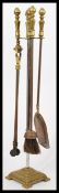 A 19th century brass fireside companion set on brass stand. Please see images.