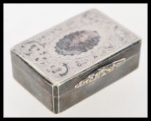 A 19th century silver white metal vinaigrette / pill box of rectangular form having chased