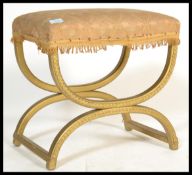 A vintage retro 20th century Lloyd Loom wicker and gilt stool raised on a X base with tapestry seat.