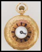 A hallmarked 18ct gold half hunter pocket watch. The white enamel face having a Roman numeral
