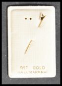 A 9ct gold tie pin of twist form having a Playboy