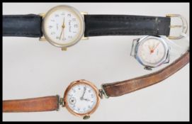 A hallmarked 9ct gold ladies cocktail watch set to a vintage black leather strap along with a