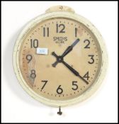 A vintage retro 20th century Smiths Sectric circular wall clock having faceted hands. Notation to