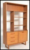 A mid century teak wood veneer Stateroom room divider bookcase / upright cabinet. Raised on shaped