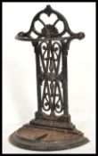 A vintage 20th century Victorian Coalbrookdale style cast metal stick stand having an ebonised