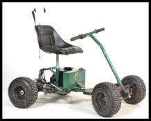 A modern electric golf buggy by ElectroKart complete with instructions manual and battery in working