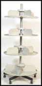 A vintage retro industrial 20th century rotary shop display unit of circular form by Rotodex