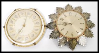 A vintage mid century retro Metamec sunburst clock along with a vintage Zodiac clock. Please see