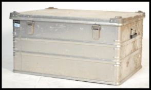 A vintage 20th Century BETRA aluminium steamer trunk, hinged top with carry handles to the side.