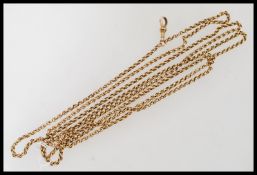 A 15ct gold large Victorian pocket watch Albert chain with clip clasp. Weighs 46.8 grams. Stamped