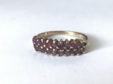 An early 20th century 18ct gold and platinum diamond ring set with a single diamond. Marked 18ct