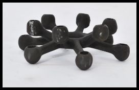 A vintage retro 20th century small candlestick holder by Dansk Design Jens Quistgaard complete in