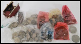 A collection of vintage British coins dating from the 19th Century to include silver and copper