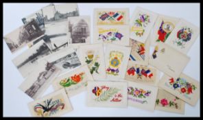 A collection of WWI era post cards to include many silks, vistas some with shell damage. Please