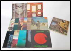 A collection of vinyl long play LP records to include Genesis Foxtrot and A Flick Of The Tail, White