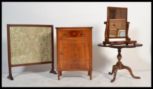 A Victorian 19th century mahogany ladies dressing table swing mirror together with a Regency revival