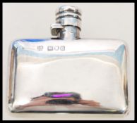A 19th century Victorian silver hallmarked hip flask by Sampson and Morgan hallmarked for London