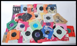 A collection of vintage vinyl records including long play /  LPs extended play / EPs and singles.