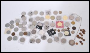 A collection of mostly commemorative crowns and coins along with a Victorian 1889 silver crown.