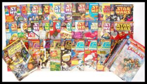 STAR WARS WEEKLY COMIC BOOKS AND COLLECTABLE CARD GAME GUIDES