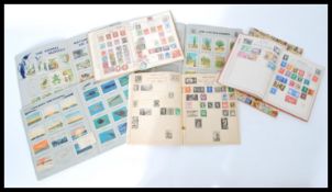 A group of vintage stamp albums containing Victorian and later stamps including penny reds etc.