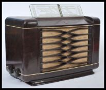 A vintage 20th Century Art Deco Philips bakelite valve radio Type 462 A / 15, the fabric covered
