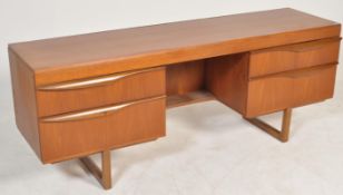 A vintage retro 20th century teak wood dressing table sideboard having reeded drawer fronts with