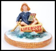 A Royal Doulton Advertising figure for Lifebuoy Soap entitled Lifebuoy Soap Boy MCL30 limited
