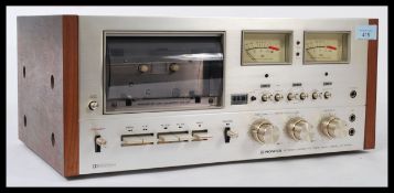 Pioneer Cassette Stereo Tape Deck Model CT F9191, teak and brushed steel casing.