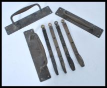 A group of antique door furnishings and window latches to include brass and bronze examples.