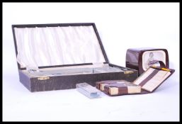 A vintage bakelite hologram musical cigarette box in the form of a television. The tv screen as a