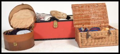 A collection of vintage hats to include a selection of men's flat caps, ladies occasion hats and