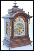 A vintage early 20th century German mantel clock having gilt ormolu acanthus leaf embellishments