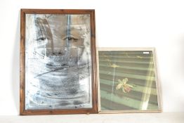 A 20th century Marilyn Monroe wall mirror together with a framed and glazed Vladimir Tretchikoff