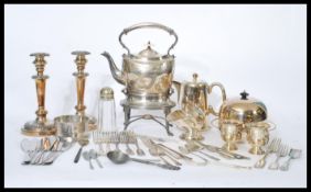 A collection of vintage silver plate to include a Walker and Hall picnic kettle spirit burner,